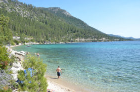 man walking on beach area