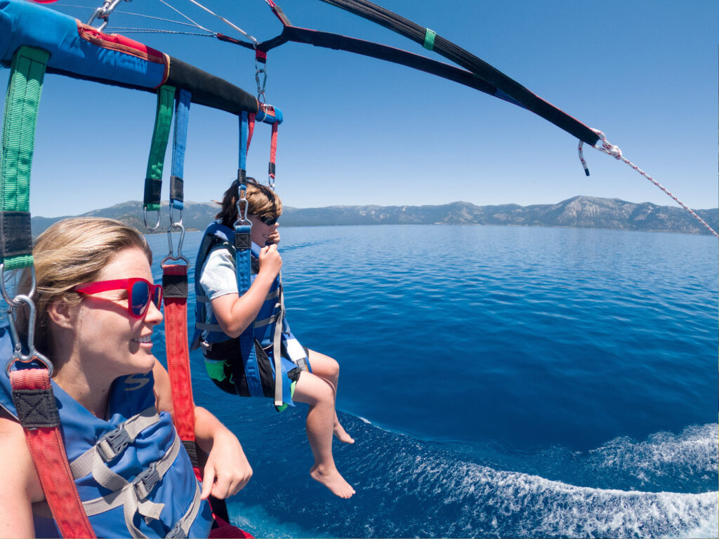 boy and lady parasailing